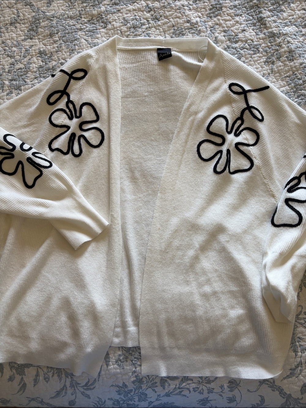 Auden Cream Open-Front Cardigan with Black Floral Outline